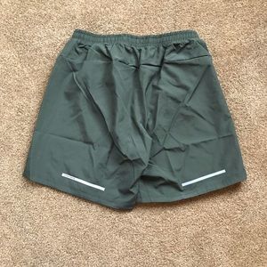 army green running shorts